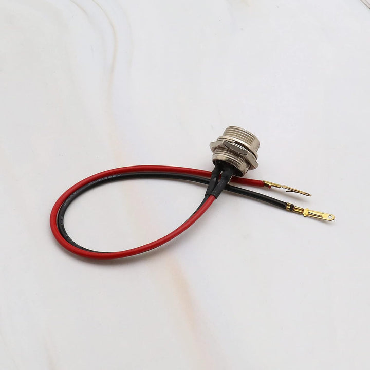 Two black 3-pin 2-wire electric scooter charging-port connectors, view 5