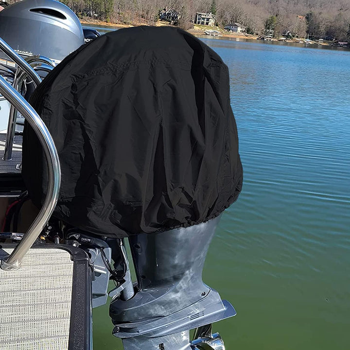Black outboard cover fitted over motor cowling; motor and boat not included