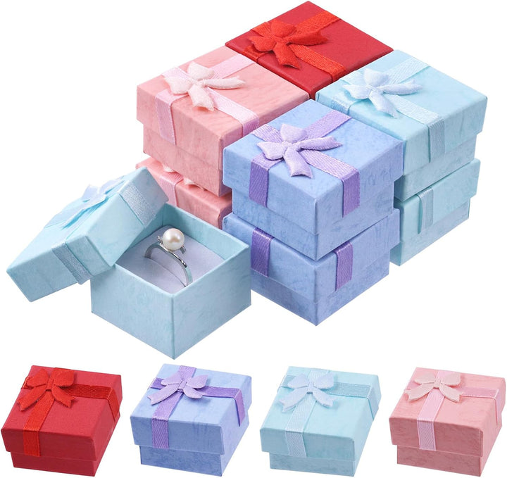 32 assorted red pink purple and blue ring gift boxes