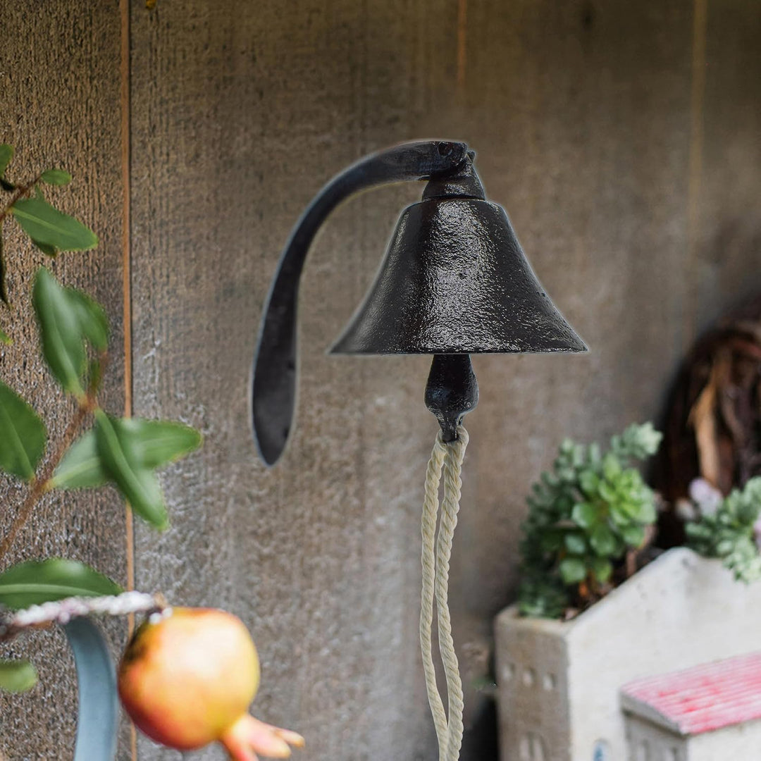 Black cast-iron wall-mounted dinner bell with rope, view 6