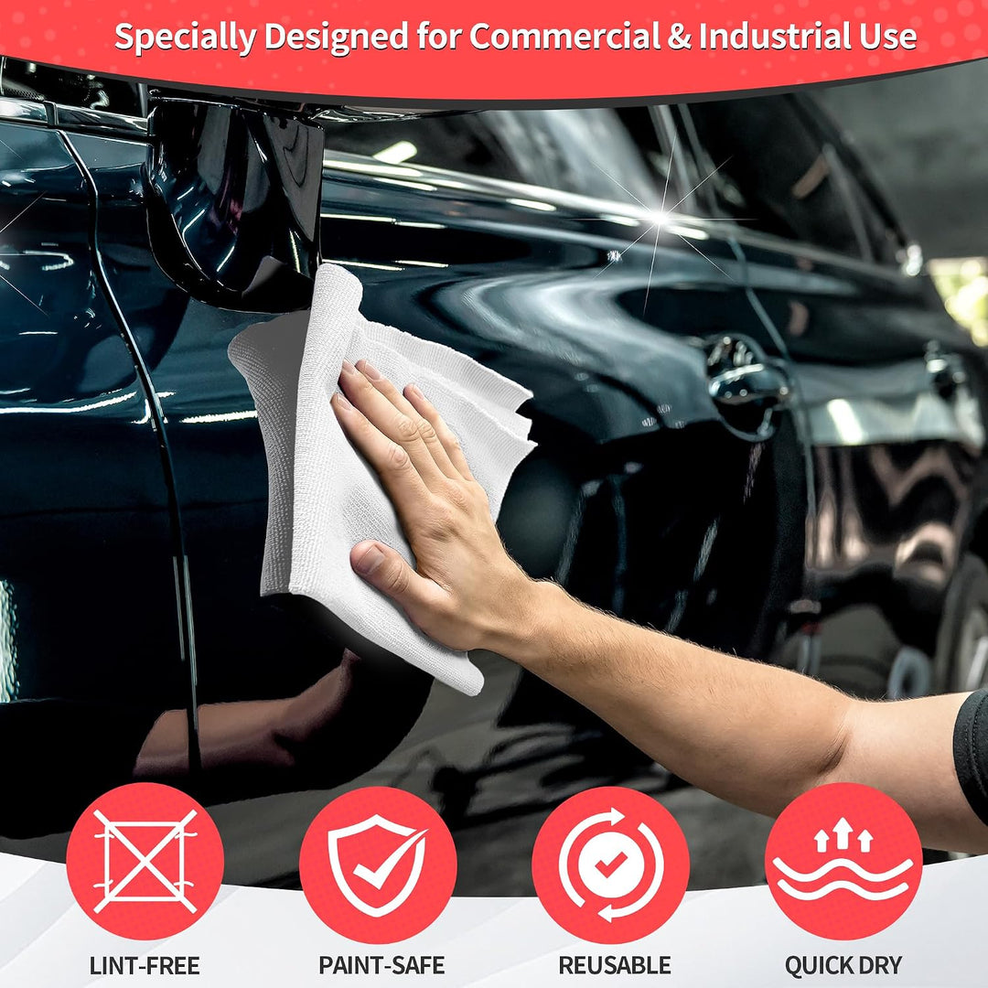 white microfiber cloth cleaning a black car