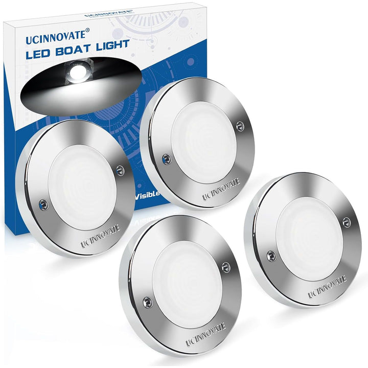 four round white LED marine lights with silver housings