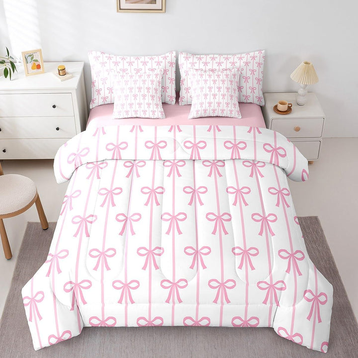 Full view of pink bow comforter and sheets