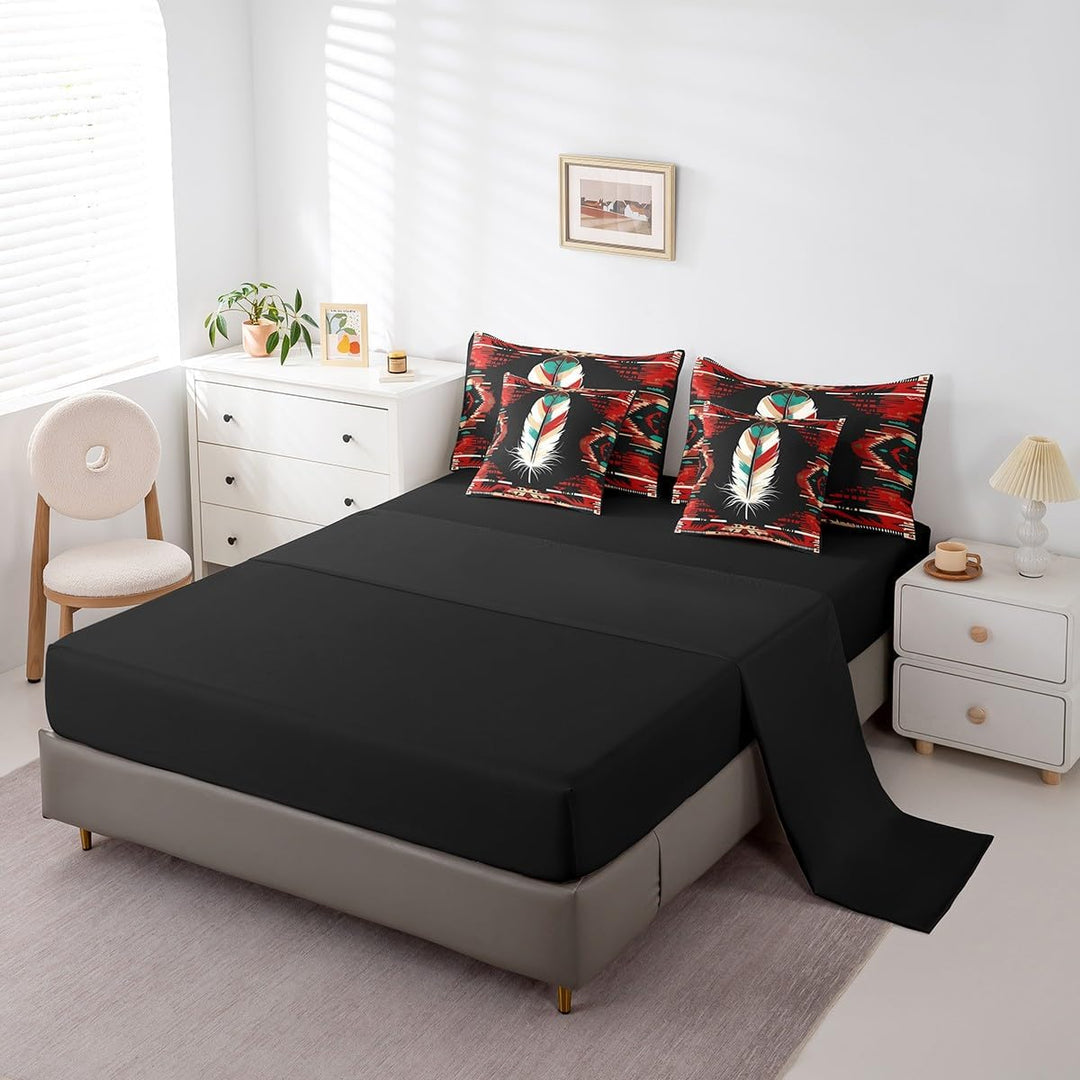 Black fitted sheet and feather-print pillowcases