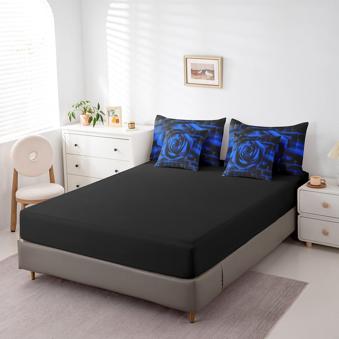 Black sheet and matching blue rose pillows