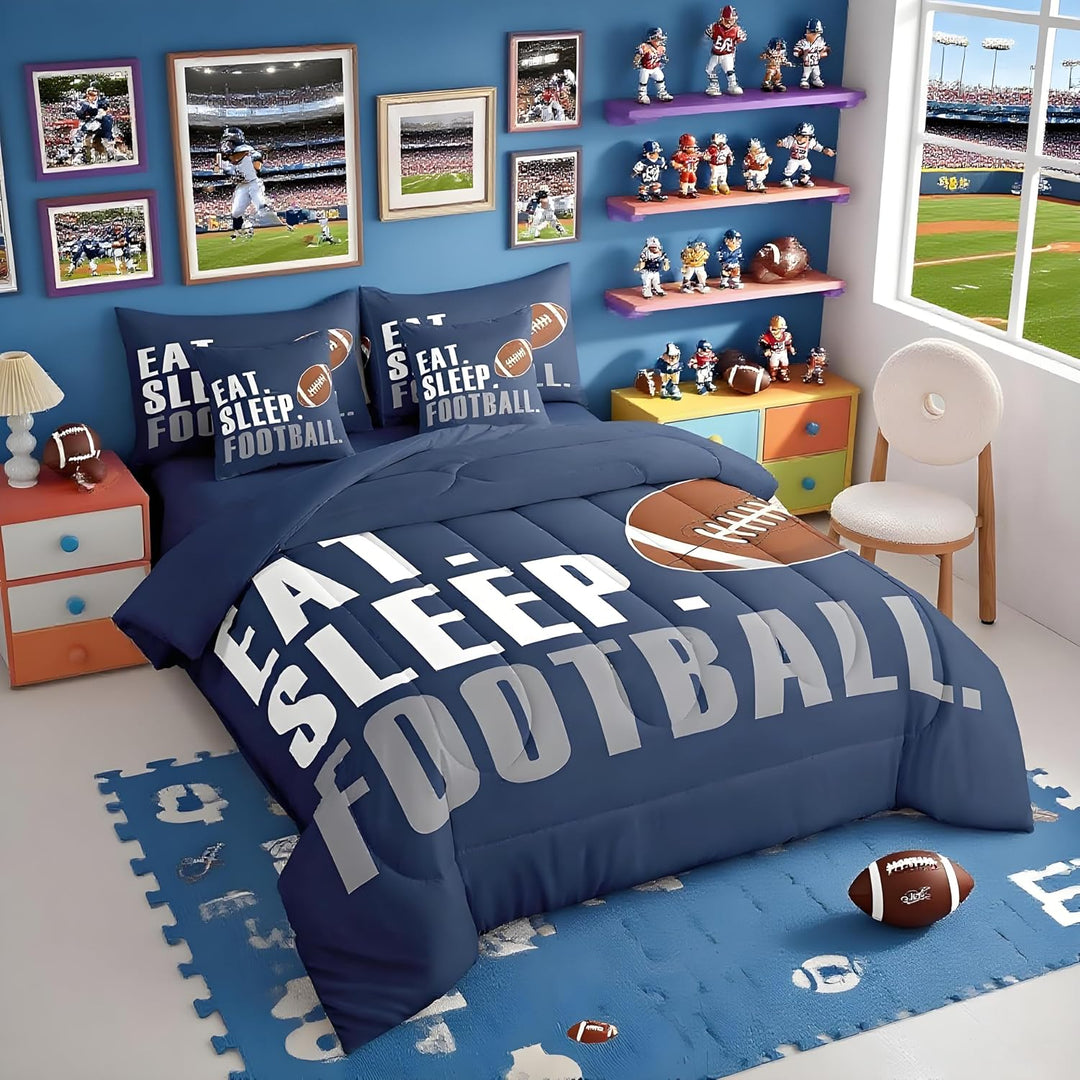 Angled view of navy football comforter and matching pillows
