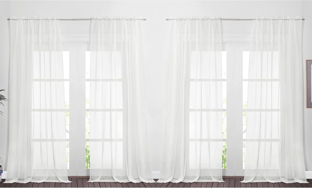 Four ivory voile sheer curtain panels