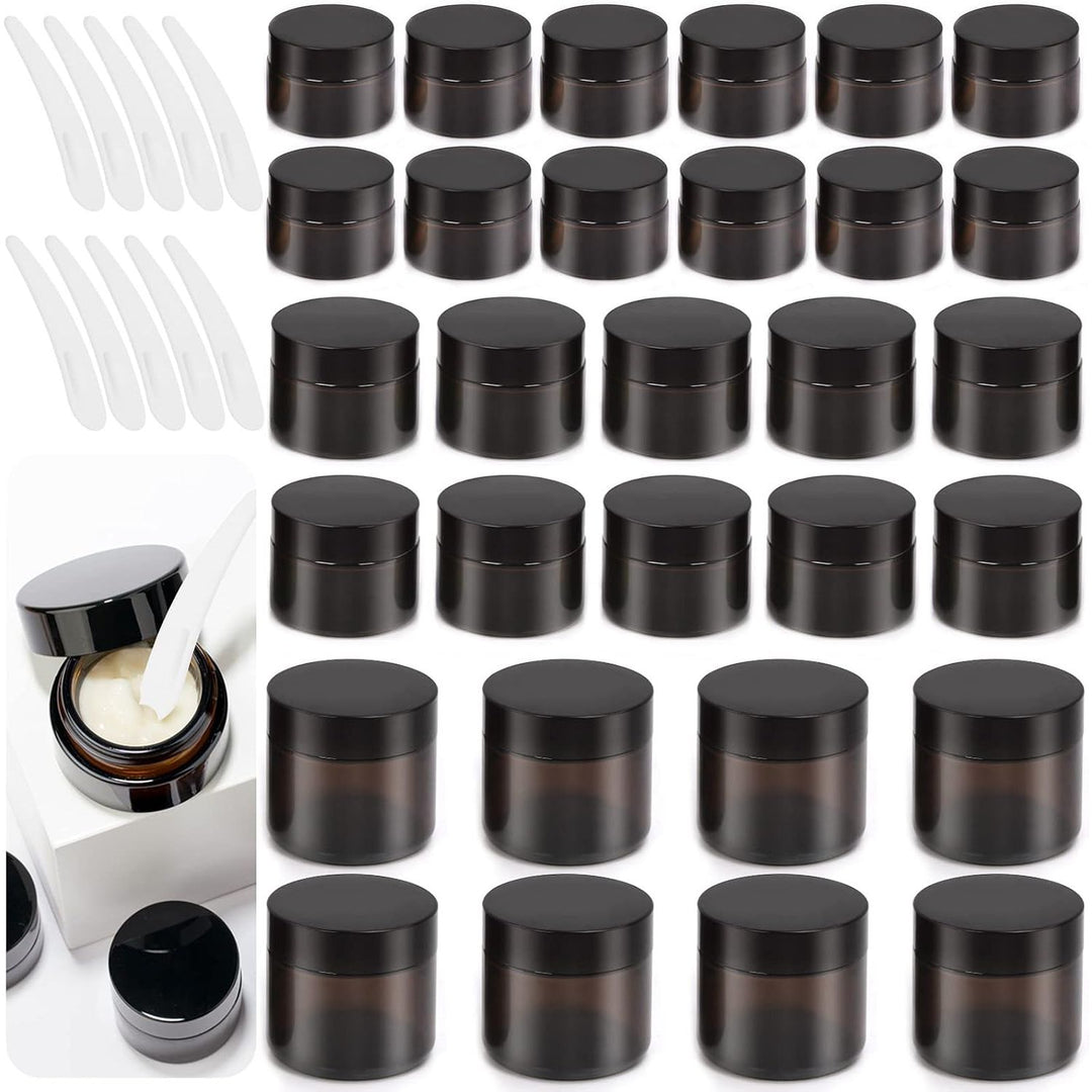 Amber glass cosmetic jar assortment with black lids and ten spoons