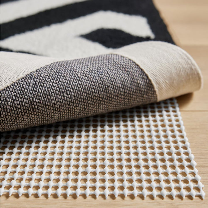 Extra Strong Rug Pad Gripper, 6x9 FT, Grips Keep Area Rugs in Place, Thick, Slip and Skid Resistant Pads for Hard Floors, Under Carpet Mat Cushion and Hardwood Floor Protection - Just Closeouts Canada Inc.