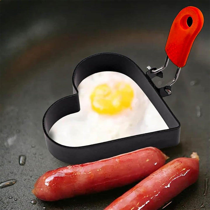 Heart-shaped egg ring shown in a frying pan