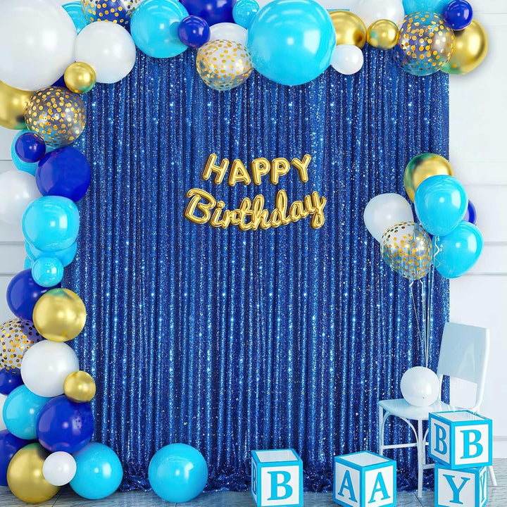 Navy blue sequin curtain with birthday decorations