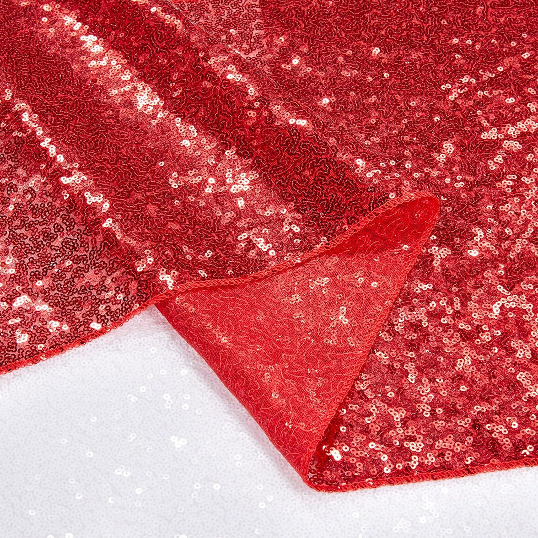 Close-up of red sequin runner fabric and backing