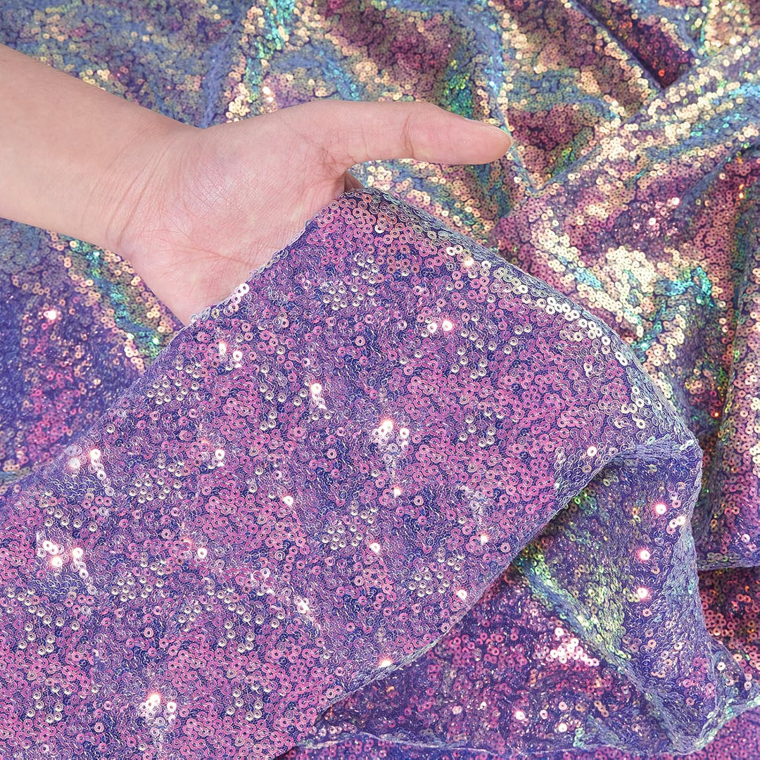 Close-up of rainbow purple sequin fabric and backing