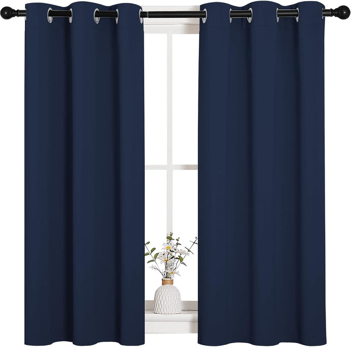 Pair of navy blue grommet curtain panels