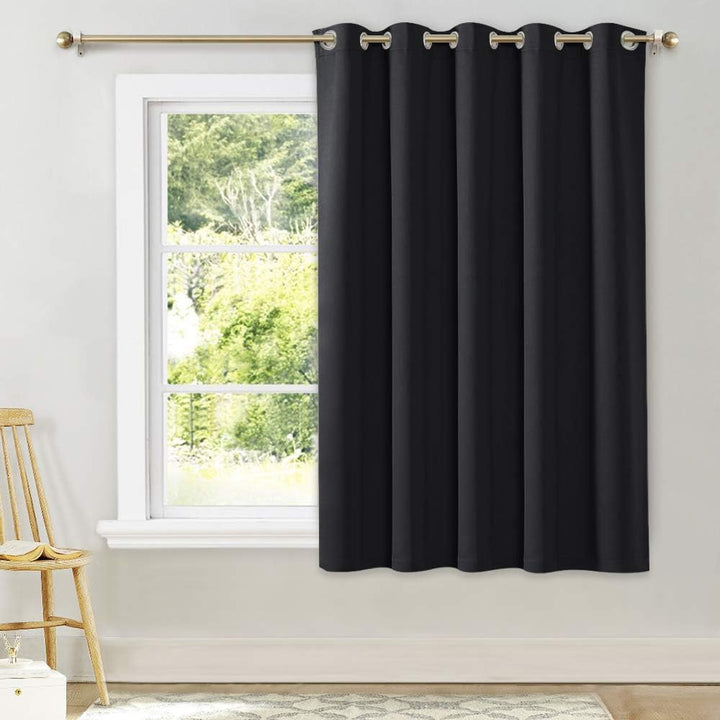 Black 70 x 63 inch blackout curtain installed