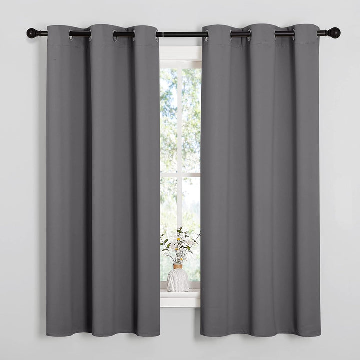 Grey 42 by 63 inch blackout curtains installed