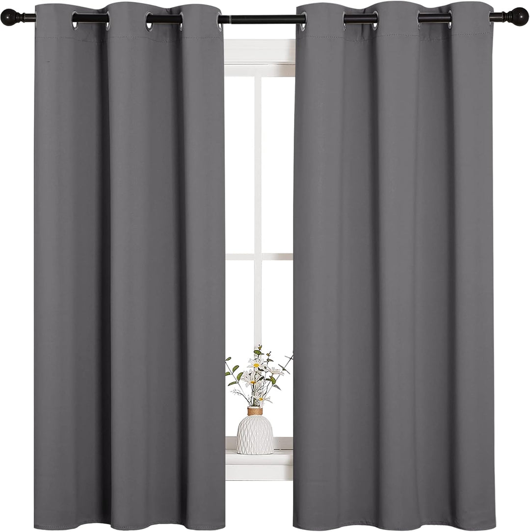 Grey curtain pair window view
