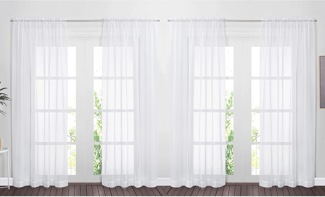White sheer rod-pocket curtains, set of four