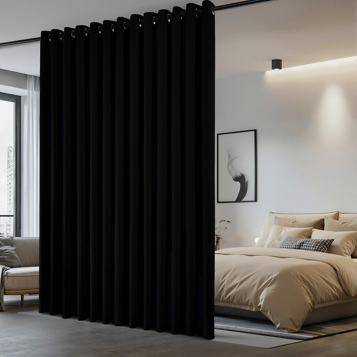 Black 15 foot by 8 foot room-divider curtain installed