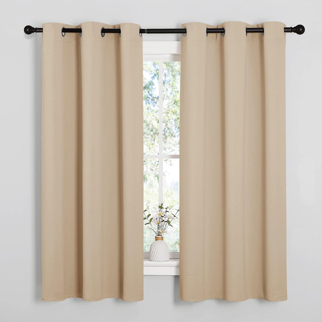 Biscotti beige blackout curtain pair on window