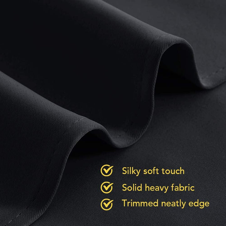 Hem and fabric detail on black blackout curtain