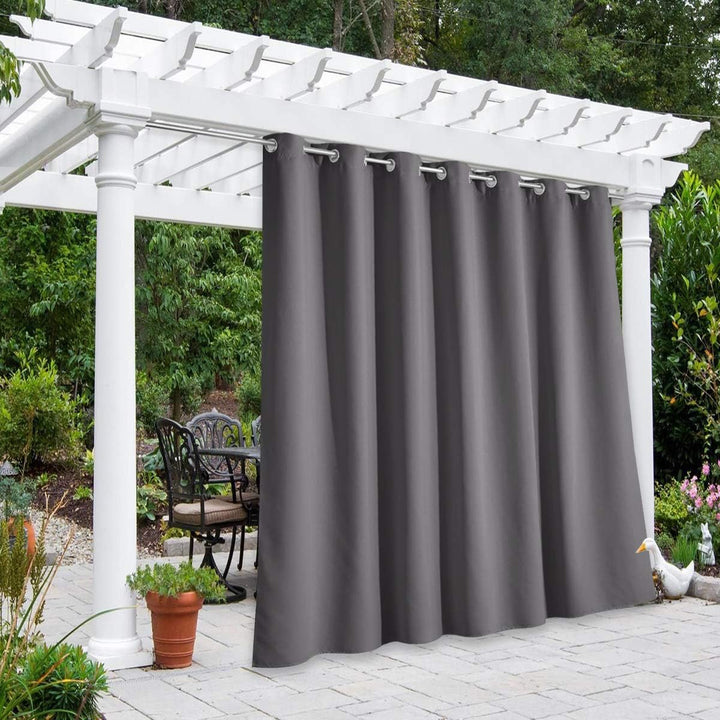 Grey waterproof outdoor grommet curtain, one 100 x 108 inch panel on patio pergola