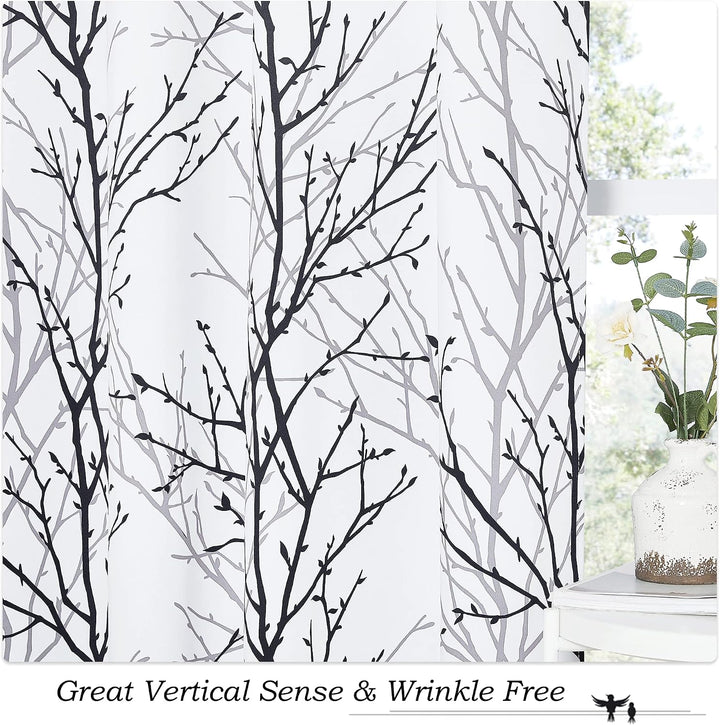 Black and grey tree-branch pattern on white curtain panel