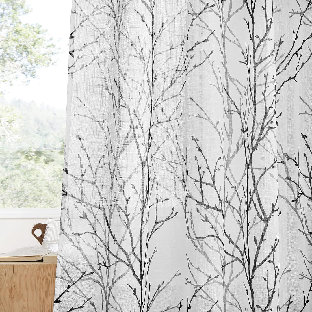 Black and grey branch-print sheer curtains, two panels