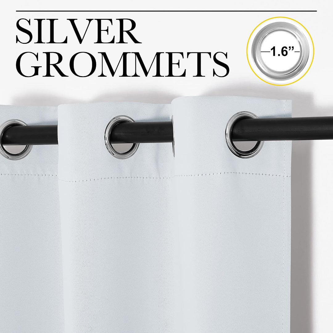Silver grommets on greyish white curtain panel