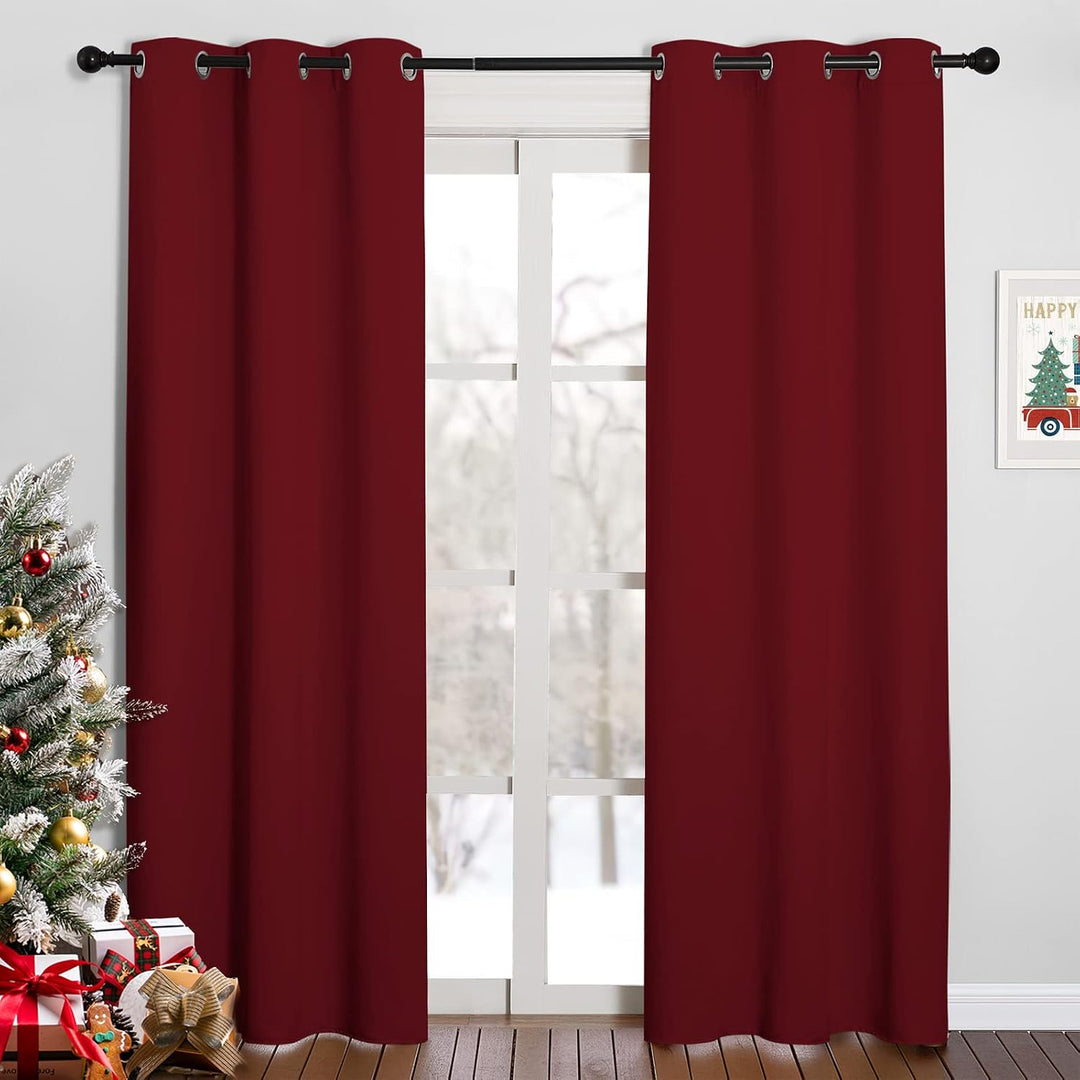 Burgundy red blackout curtain pair on window