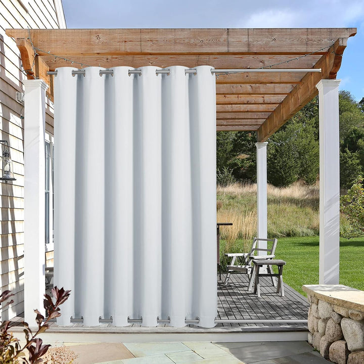 Greyish white outdoor curtain panel with top and bottom grommets on pergola