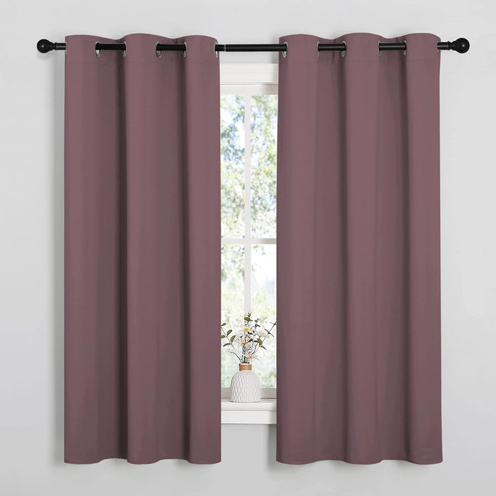 Dry rose 42 x 63 inch grommet curtains in a room