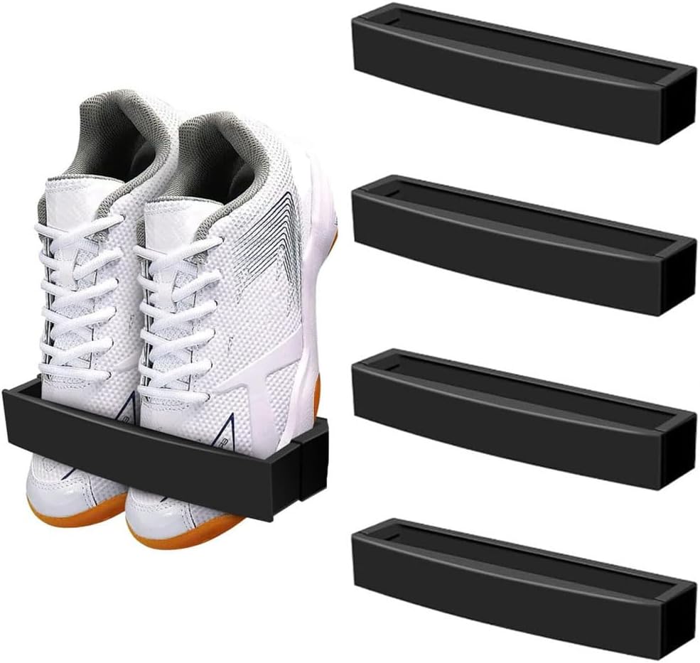 Four black adjustable wall-mounted shoe holders