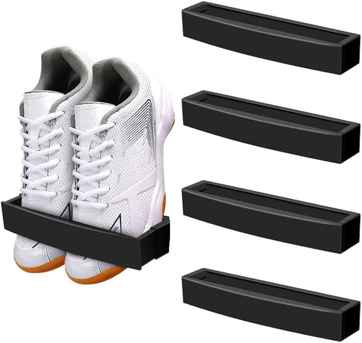 Four black adjustable wall-mounted shoe holders