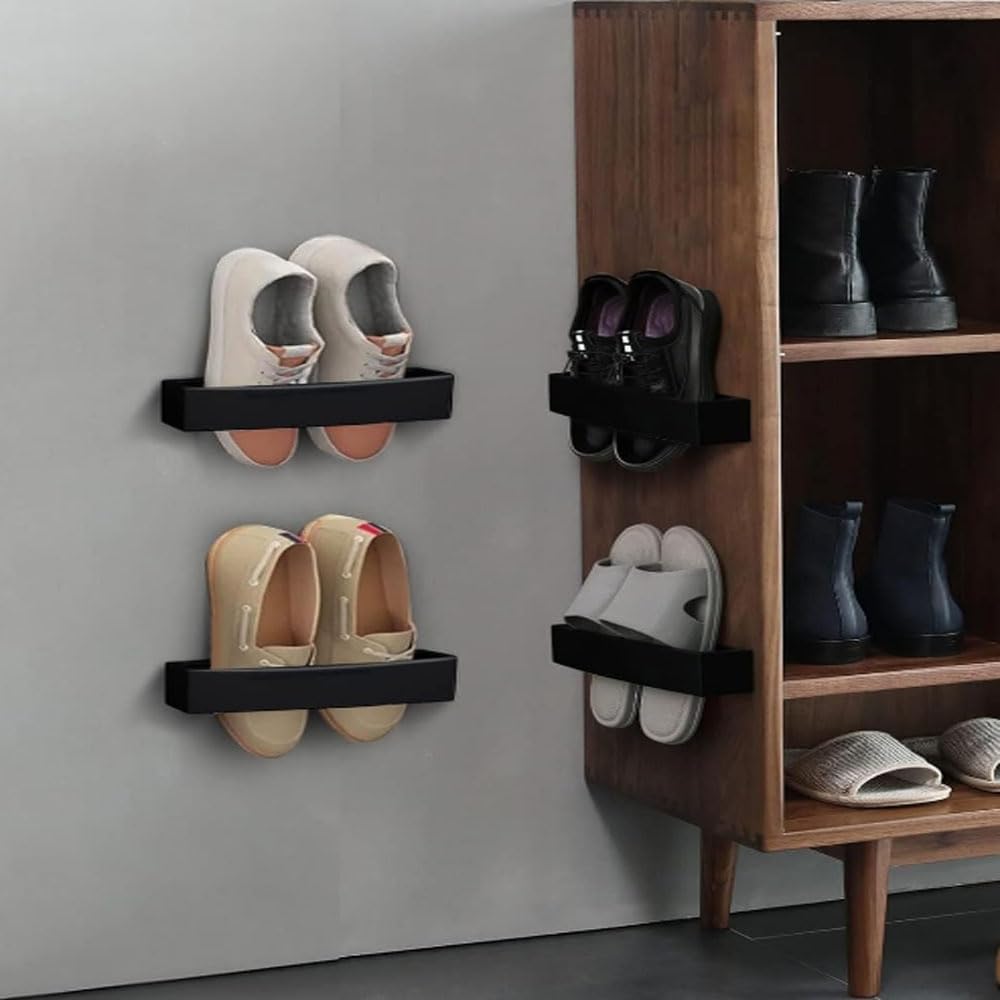 Four black adjustable wall-mounted shoe holders