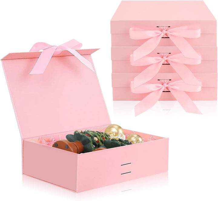 Four pink magnetic gift boxes with ribbons, view 1