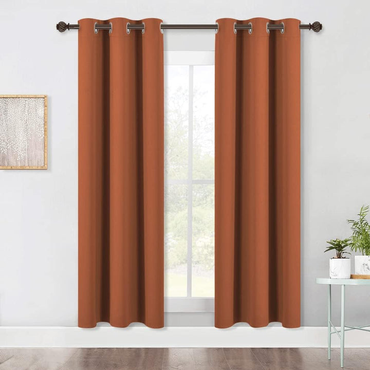 Burnt-orange grommet blackout curtains, two panels, 42 x 72 inches each