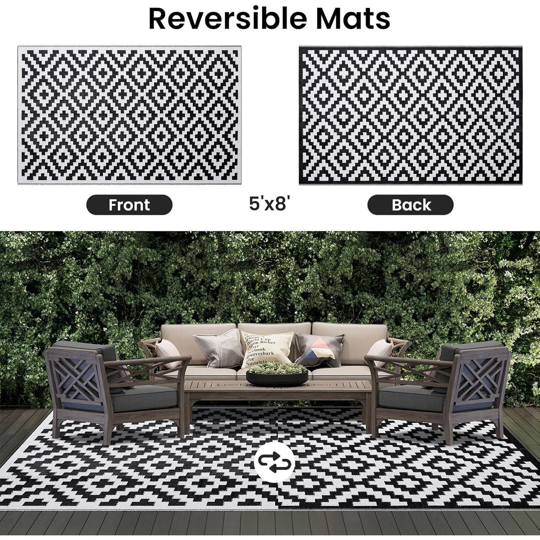 OLANLY Outdoor Rug Waterproof Reversible 5x8 ft, Durable Plastic Straw Patio Camping Carpet, Large Foldable RV Mat for Backyard, Deck, Picnic, Camper, Bench, All - Weather, Lightweight, Black & White - Just Closeouts Canada Inc.