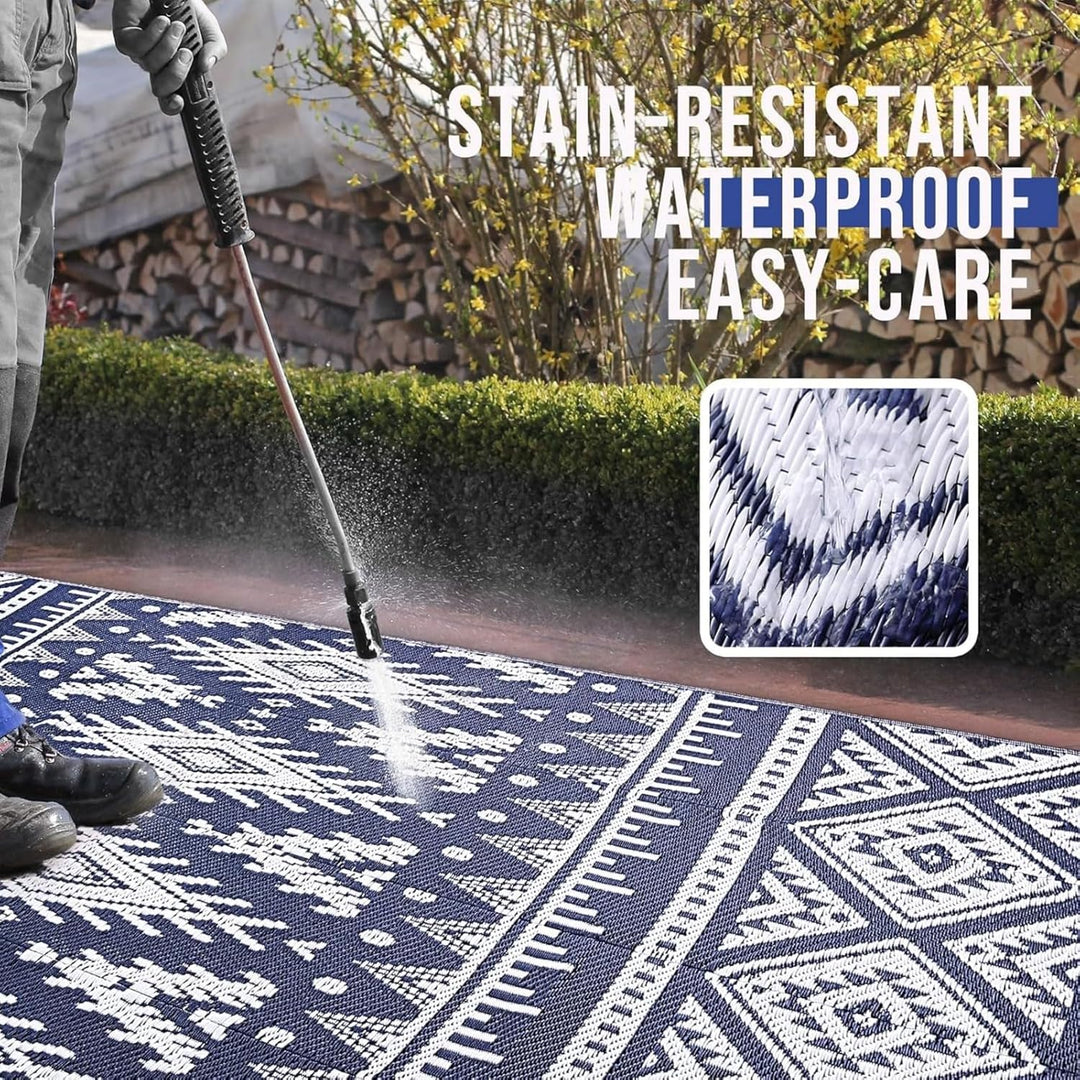 OLANLY Waterproof Outdoor Rug 6x9 ft, Reversible Plastic Straw Patio Camping Rugs, Large Foldable Outdoor Carpet Deck Rugs for Patio, RV, Outside Entry, Backyard, Bench, Picnic, Navy & White - Just Closeouts Canada Inc.