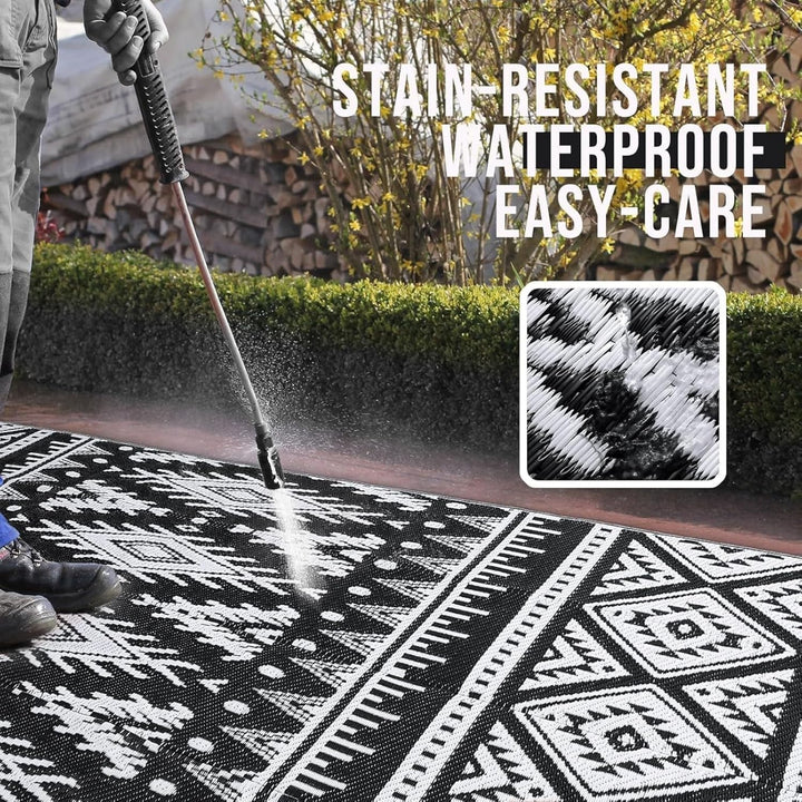 OLANLY Waterproof Outdoor Rug 6x9 ft, Reversible Plastic Straw Patio Camping Rugs, Large Foldable Outdoor Carpet Deck Rugs for Patio, RV, Outside Entry, Backyard, Bench, Picnic, Black & White - Just Closeouts Canada Inc.