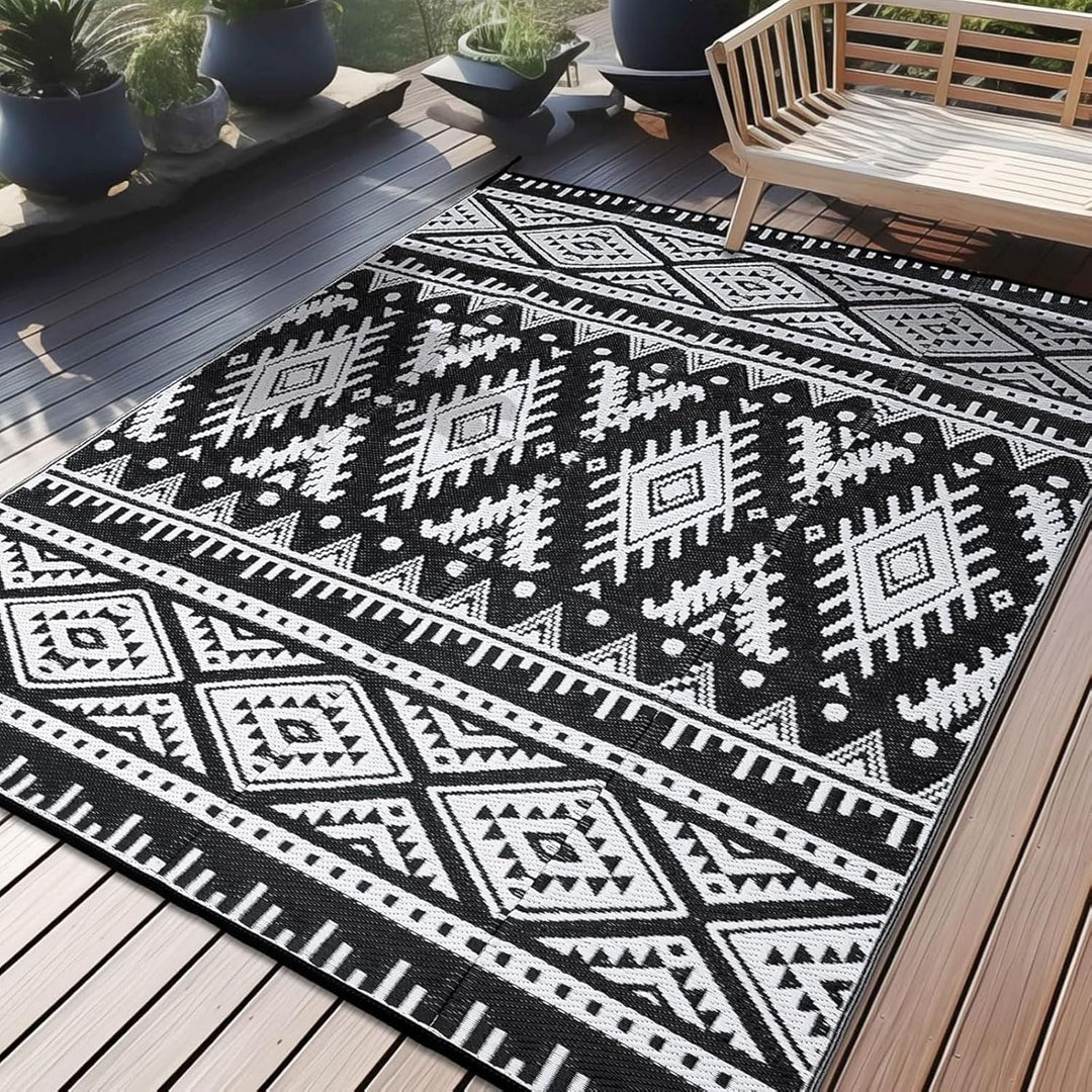 OLANLY Waterproof Outdoor Rug 6x9 ft, Reversible Plastic Straw Patio Camping Rugs, Large Foldable Outdoor Carpet Deck Rugs for Patio, RV, Outside Entry, Backyard, Bench, Picnic, Black & White - Just Closeouts Canada Inc.