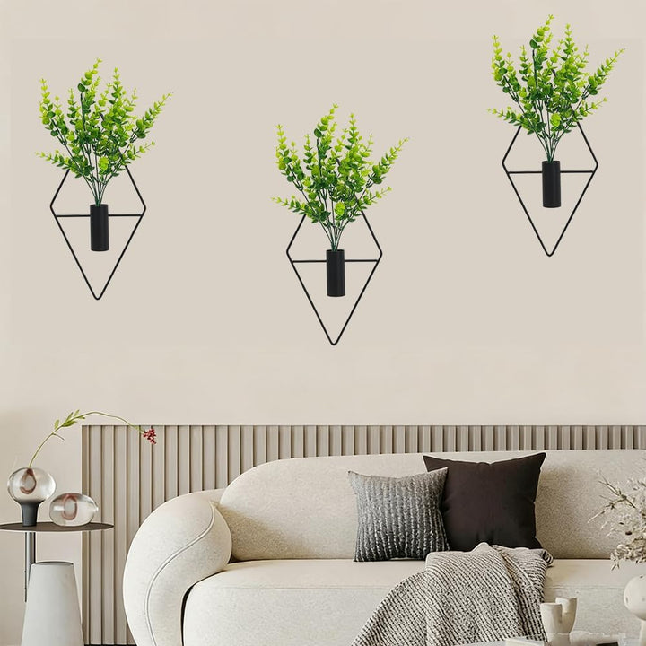 Black rhombus wall planter with artificial foliage, source view 3