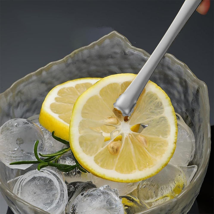 Ice tongs used with a drink