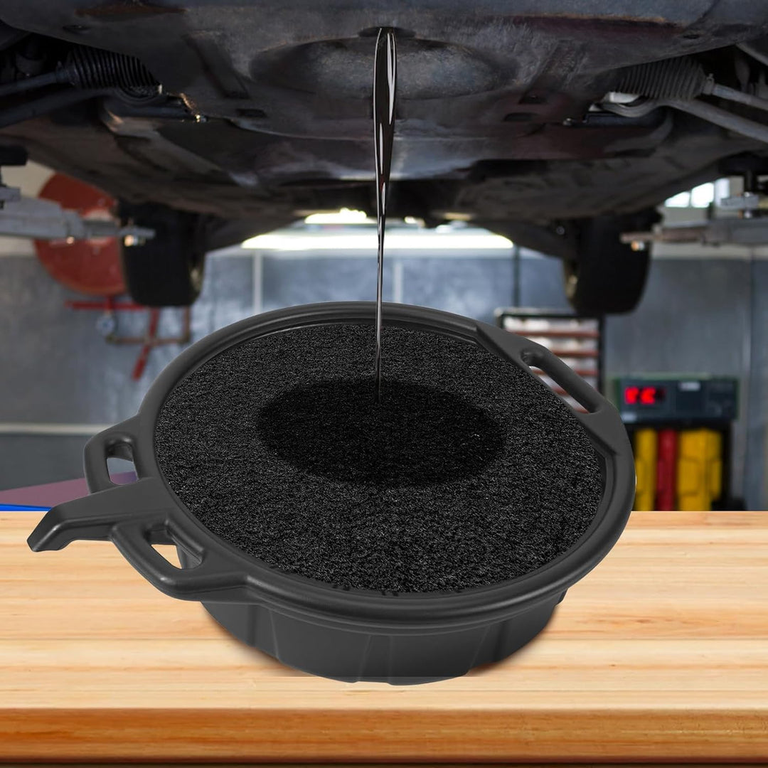 Round splash pad fitted in an oil drain pan; pan not included