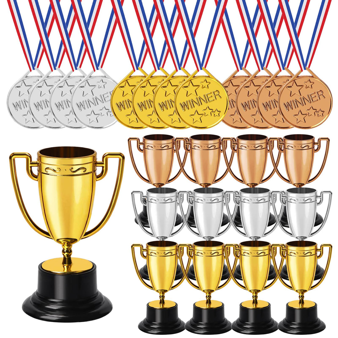 Gold, silver and bronze trophy cups with winner medals