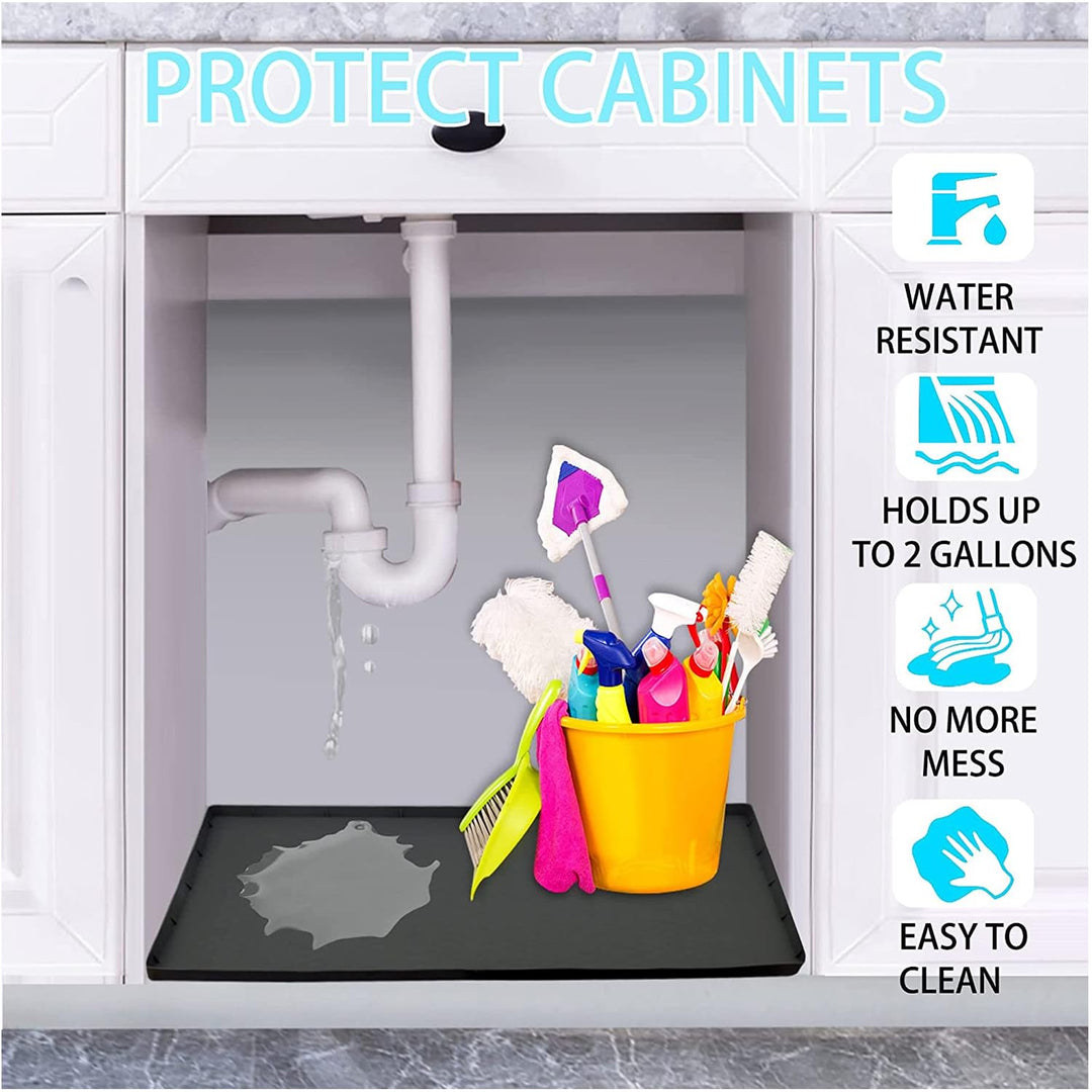 Cabinet mat containing drips beneath sink pipes