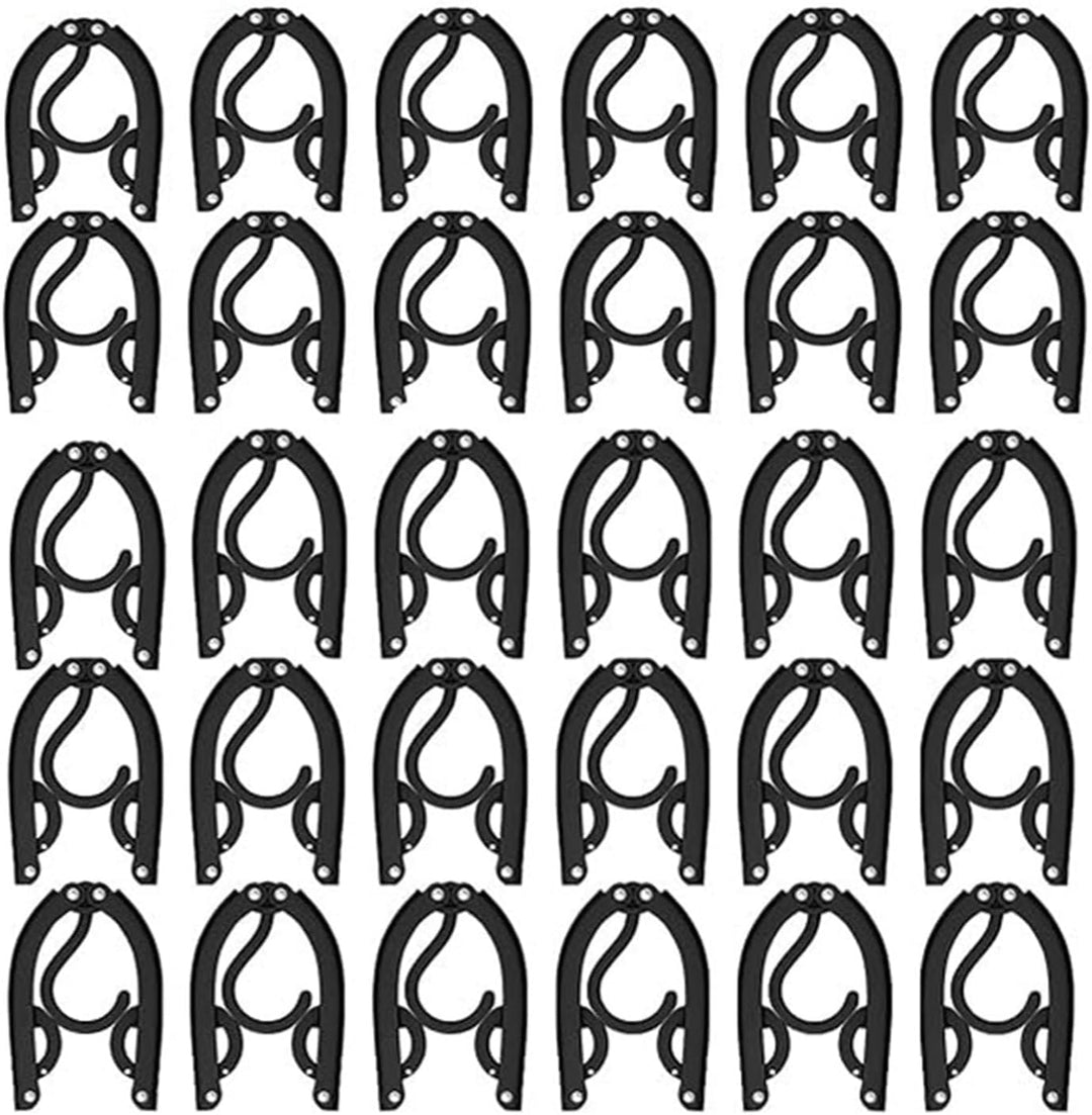 Thirty black folding travel clothes hangers