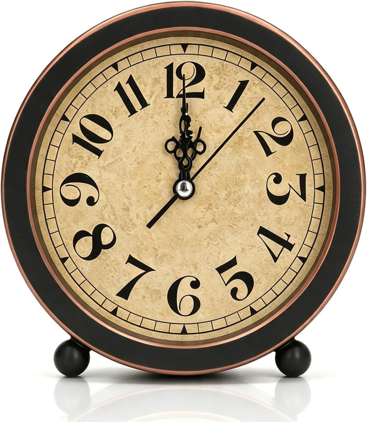 Vintage 5.3-inch black and copper analog table clock