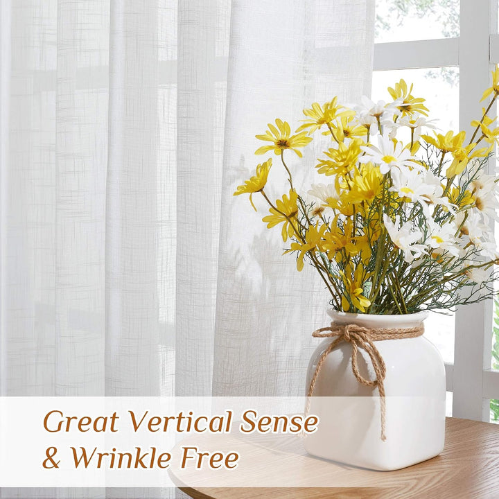 White linen-look semi-sheer curtain at a window